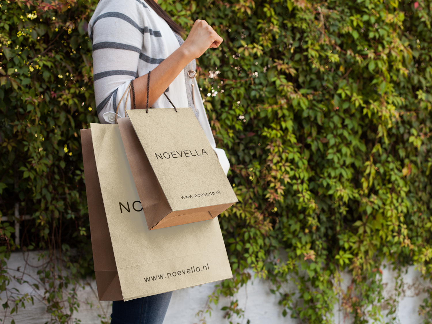 paper-bag-mockup-of-a-woman-carrying-two-shopping-bags-a6683_2_a4f92084-21a8-4a7e-a310-d4c89c0d1293